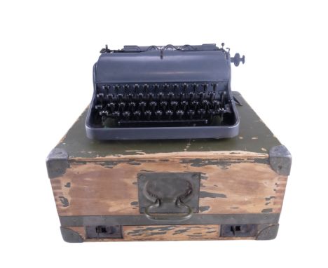 A German Third Reich Wehrmacht / Waffen SS issue typewriter, an Olympia "Robust" model in military transit case, having an SS