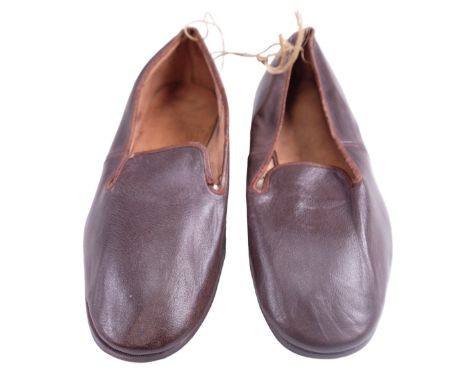 A 1943 dated pair of British Army / ATS brown leather slippers, size 6