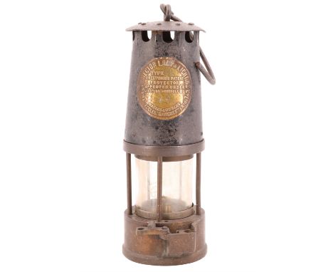 A miner's safety lamp by The Protector Lamp &amp; Lighting Co Ltd of Eccles Manchester, type SL, circa 1920-1960, 24 cm exclu