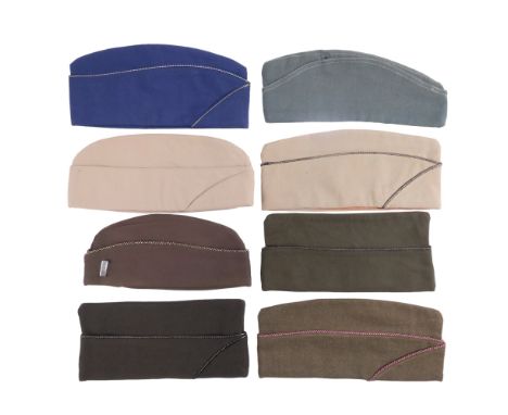 Six US army officers' and other ranks' garrison caps, a US Air Force example and one other cap