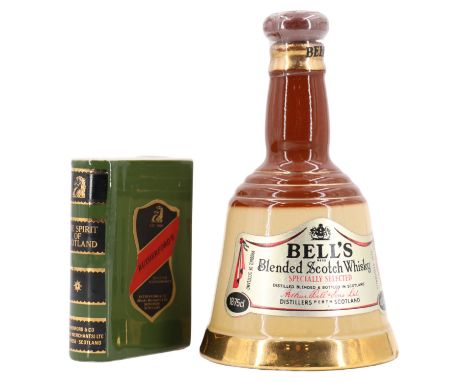 A small Wade Bells Scotch Whiskey decanter, 16 cm, together with a novelty Rutherfords whiskey book form decanter, 9 cm 