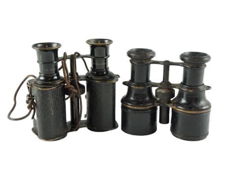 A pair of early 20th Century Radium Prismoid binocular field glasses together with a similar pair 