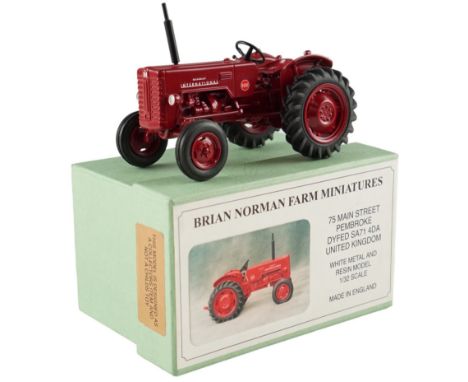 A boxed Brian Norman Farm Miniatures McCormick International B-250 (FM 11) diecast model tractor, with signed and dated certi
