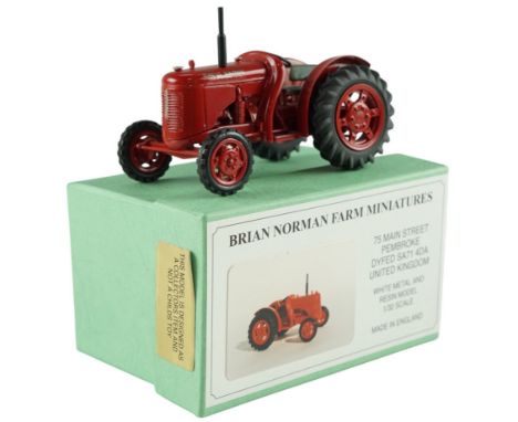 A boxed Brian Norman Farm Miniatures David Brown Cropmaster (FM 05) diecast model tractor, with signed and dated certificate 