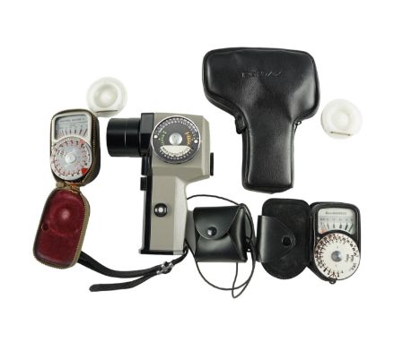 Three vintage light meters including a Pentax Spotmeter V, a Weston Master V and a Euro-Master II