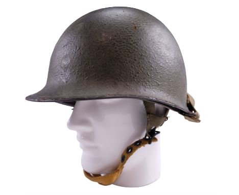 A US army paratroop pattern steel helmet