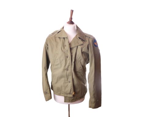 A Second World War US Army Field Jacket bearing a USAAF cloth badge