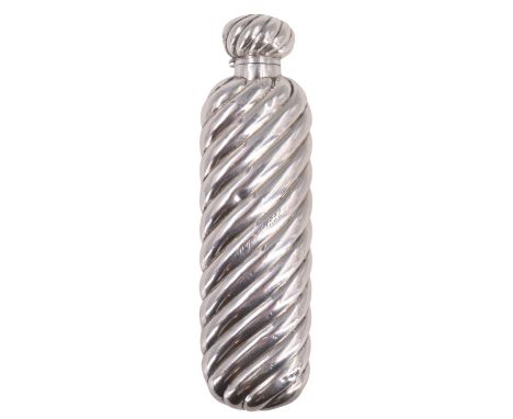 A Victorian silver perfume flask, having helical reeded decoration and a hinged lid enclosing a lapidary stopper, the top bea