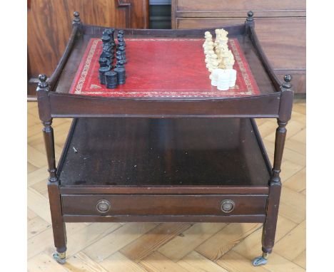 A late 20th Century mahogany games table, on turned supports with an under-shelf having two drawers, the two piece top respec