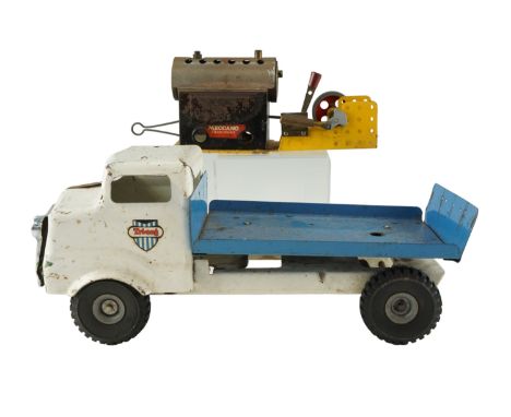 A 1950s Tri-ang tinplate milk lorry together with a Meccano steam engine, former 35 cm long, (a/f)