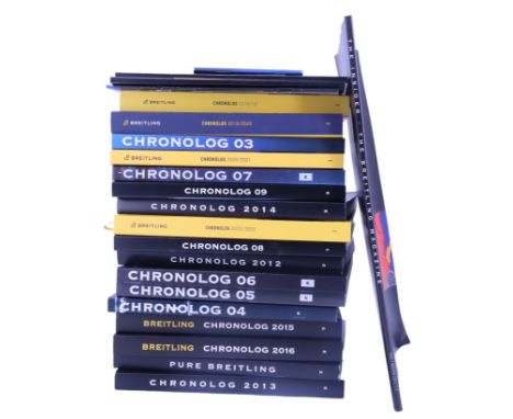 A large quantity of Breitling Chronolog watch year books and related publications