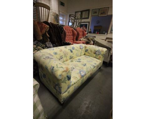 Victorian Drop-end Sofa upholstered in yellow and floral patterned fabric