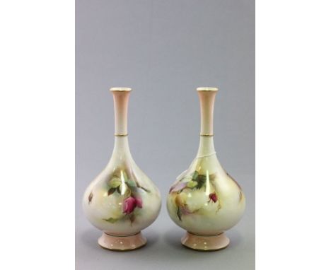 Pair of Royal Worcester Vases, hand painted with flowering roses, both signed K Austin and marked F104/H10