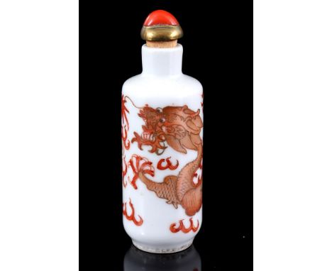 Porcelain snuff bottle decorated with a dragon with five claws, Kangxi character mark, China 19th century, 9 cm high