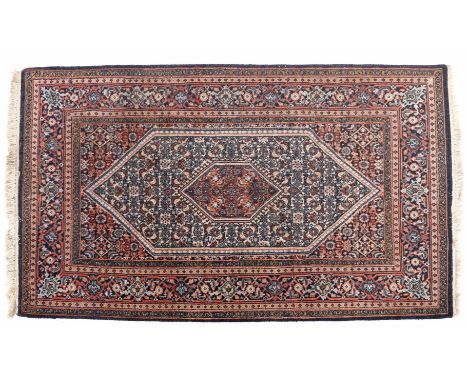 Hand-knotted wool carpet with oriental decor, 180x120 cm