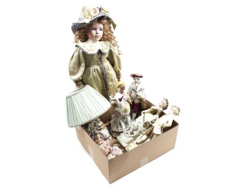 Box with porcelain figures, table lamp and porcelain doll, 62 cm