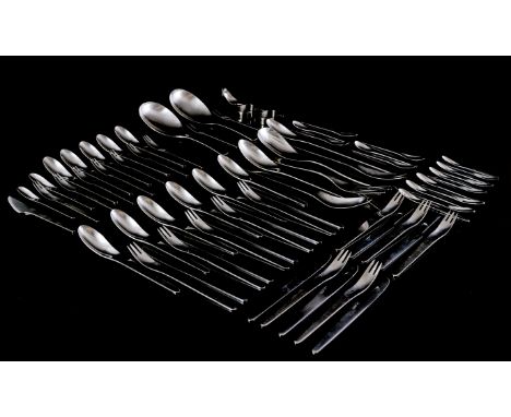 Minimalist 79-piece stainless steel cutlery, design Arne Jacobsen executed by A. Michelsen (later Georg Jensen), design year 