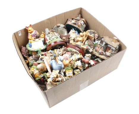 Box of various ceramic figurines of rabbits including Goebel Germany houses