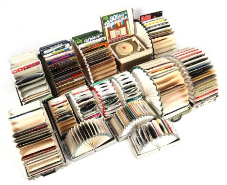 Lot b.u. TrioTrack record player 6 cases with LPs and 7 with singlesProceeds benefit the KWF (Queen Wilhelmina Fund) Cancer C