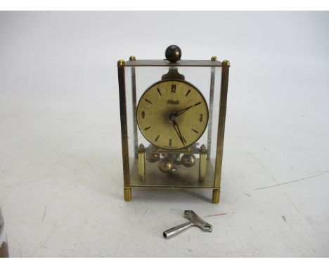 Vintage Kundo glass panelled German mantle clock, with key. 