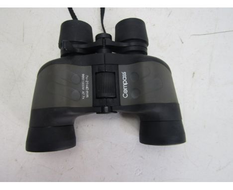 A pair of Compass 7x21x49mm binoculars (96M/1000M AT 7x 