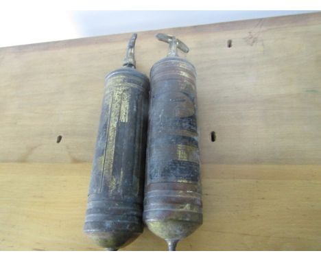 Pair of vintage Pyrene brass fire extinguishers 