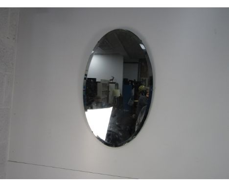 Vintage oval bevelled edge mirror, H68 x W41cms 