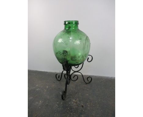Vintage glass carboy and stand. H61 x W35. 