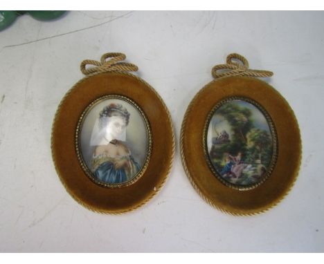 A pair of vintage hand painted pictures in velvet covered frames and backed in silk 