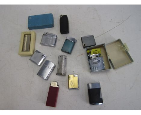 Collection of vintage lighters to include  a Ronson Cadet and some boxed lighters 