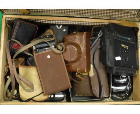 A collection of various cameras to include a Pathescope model "H", Kodak Brownie Flash III camera, Kodamatic 950 instant came