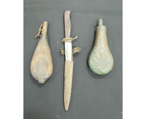 A World War One German trench type dagger and sheath together with a Victorian embossed brass powder flask and a leather shot