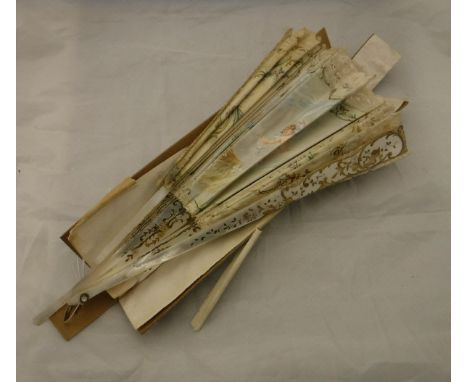 A 19th Century French mother of pearl stick fan with hand painted decoration of classical maiden amongs clouds with cherubs s