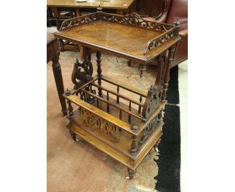 A Victorian burr walnut Canterbury with galleried shelf over three tiers and three section music stand and single drawer, 59c