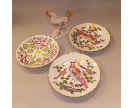 A pair of Sampson porcelain plates decorated with exotic birds, a Sampson figure of a chicken, Worcester style cup and saucer