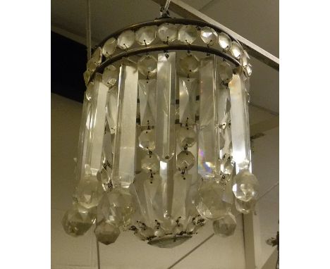 A circa 1900 facet cut glass bag ceiling light with heavy cut glass drops