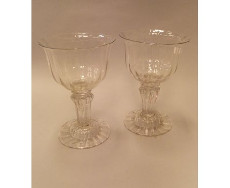 A pair of 18th Century sweetmeat glasses with wrythen bowl on a Silesian stem to domed foot CONDITION REPORTS Both glasses ha