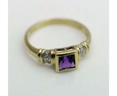 A 9ct gold ladies dress ring, the central square cut amethyst flanked by diamond set shoulders