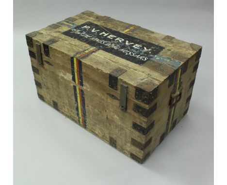 A Victorian iron bound pine trunk with zinc lined interior the top painted "P. V. Hervey. 15th/19th The Kings Royal Hussars",