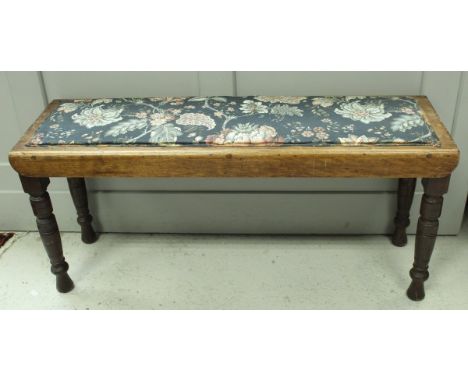 A Victorian campaign bench or duet stool bearing ivorene plaque "Leslie Belcher House Furnishers, 6 New Broadway, Ealing W" t