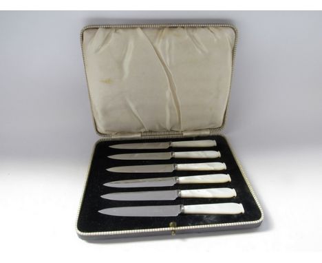 A set of mother-of-pearl handled fruit knives