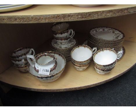 A W.A.A &amp; Co. part tea service with swag design