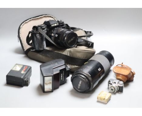 A Minolta 9000 SRL camera, a Minolta 75-300 zoom lens, with flash, together with a Sanwa Mycro miniature camera, with leather