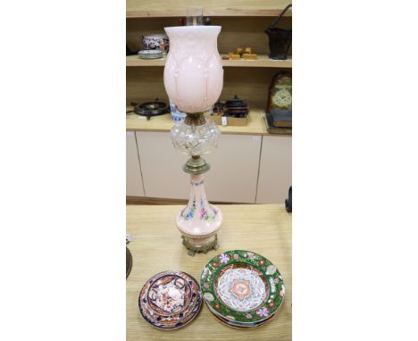 An ormolu mounted bone china oil lamp, height overall 80cm, an ironstone dessert dish and other tablewareCONDITION: Lamp good