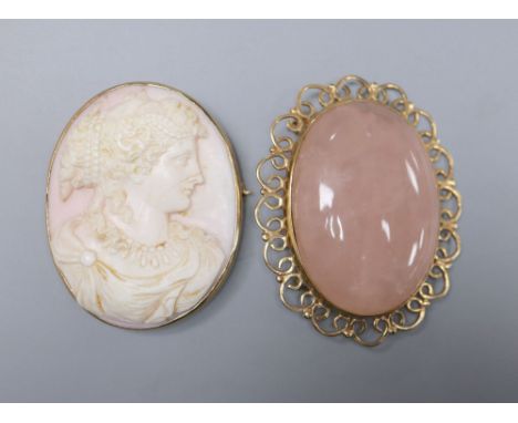 A 9ct gold-framed carved shell cameo portrait brooch and a 9ct gold-framed rose quartz brooch, 46mm, gross 34 grams.CONDITION
