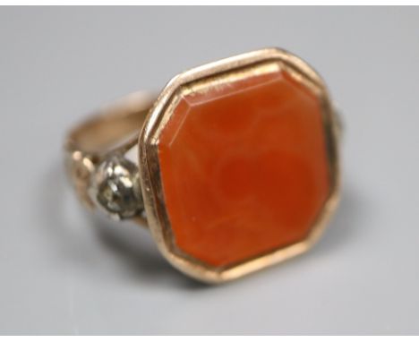 A Georgian yellow and white metal, octagonal carnelian and rose cut diamond set ring, size R/S, gross 6.1 grams.CONDITION: St