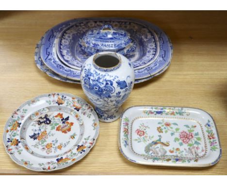 Three blue and white meat platters, largest 49cm wide, two ironstone plates and a tureen and a Delft vaseCONDITION: General w