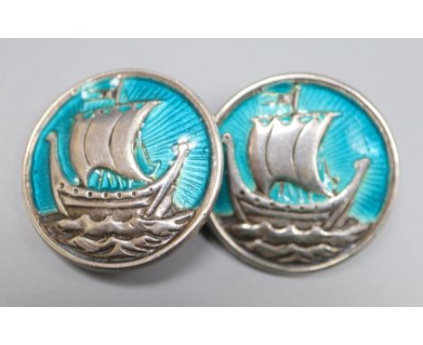 A pair of white metal (stamped silver) and enamel 'longboat' circular cufflinks, 27mm, gross 25.7 grams.CONDITION: Possibly c