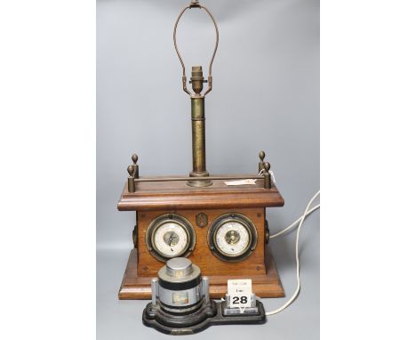 An Art Deco chromium desk calendar/barometer and a mahogany table lamp with thermometer and barometer dials and brass gallery