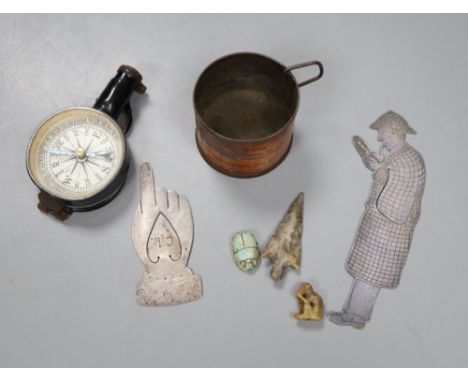 Two novelty bookmarks, compass, flint arrow head, and a collection of coins, etc.